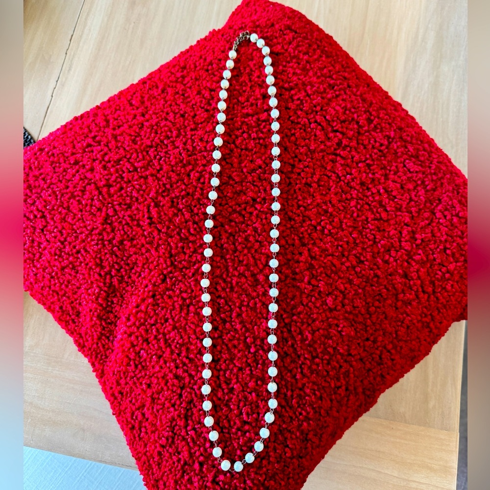 Long faux pearl necklace